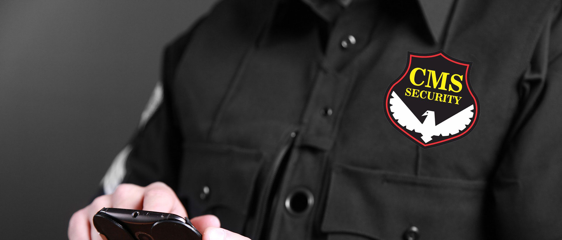 CMS Security guard uniform with company badge – residential and gate security in Raipur